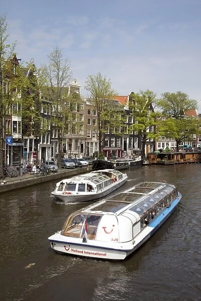 Canal boats and architecture, Amsterdam, Holland, Europe