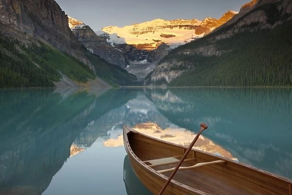 Canoe on Lake Louise at sunrise, Banff National Park, UNESCO World Heritage Site, Alberta, Rocky Mountains, Canada, North America