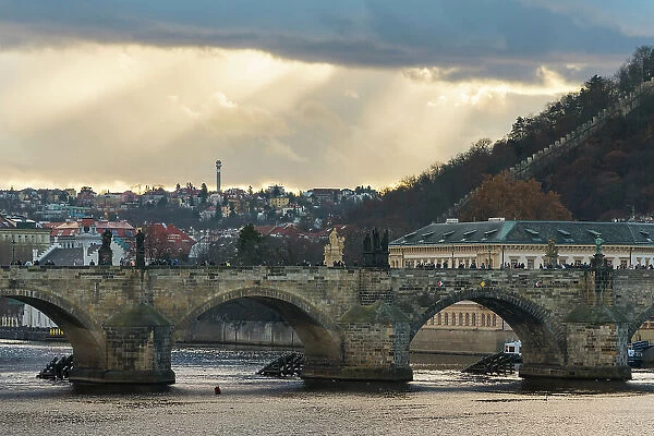 Charles Bridge against dramatic sky, UNESCO World Heritage Site, Prague, Bohemia, Czech Republic (Czechia), Europe
