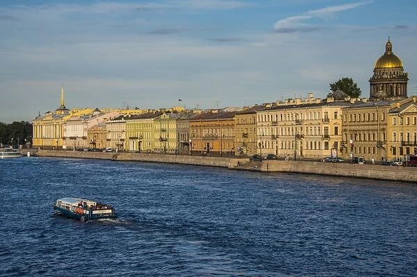 City center of St. Petersburg from the Neva River at sunset with St. Isaac Cathedral in the background, St. Petersburg, Russia, Europe