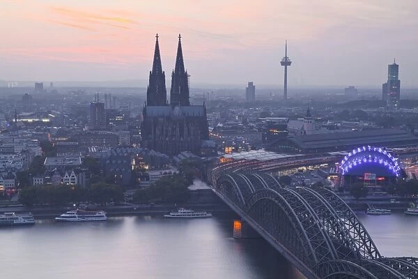 The city of Cologne and River Rhine at dusk, North Rhine-Westphalia, Germany, Europe