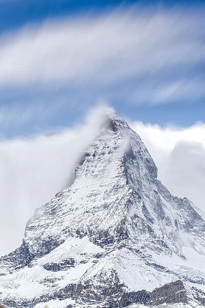 Clouds over Matterhorn covered with snow, Pennine Alps, Zermatt, canton of Valais