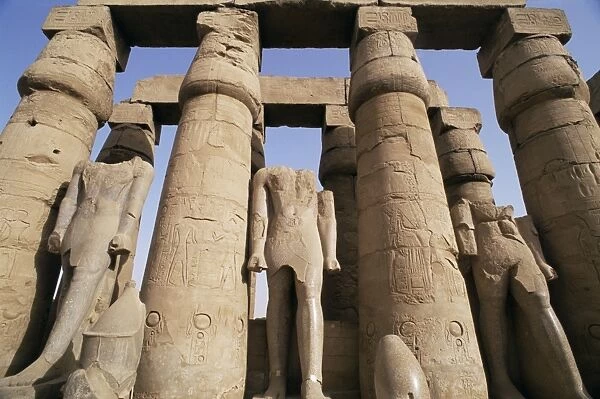 Colonnade and Osiris statues, Luxor Temple, Thebes, UNESCO World Heritage Site