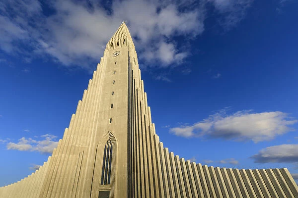 Exterior view of Hallgrimskirkja, the largest Lutheran church in Reykjavik, blue sky