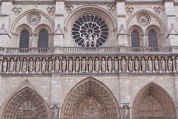 The facade of Notre Dame de Paris cathedral, Paris, France, Europe