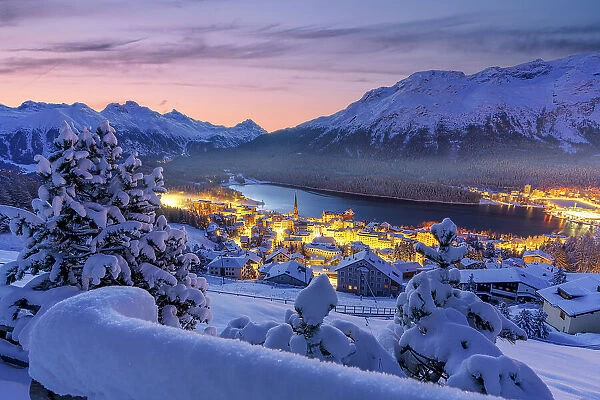 Fairy tale view of Saint Moritz on a snowy winter dusk, Engadine, Graubunden canton, Switzerland, Europe