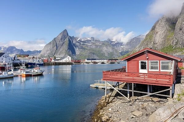 Fishing village and harbour framed by peaks and sea, Hamnoy, Moskenes, Nordland county