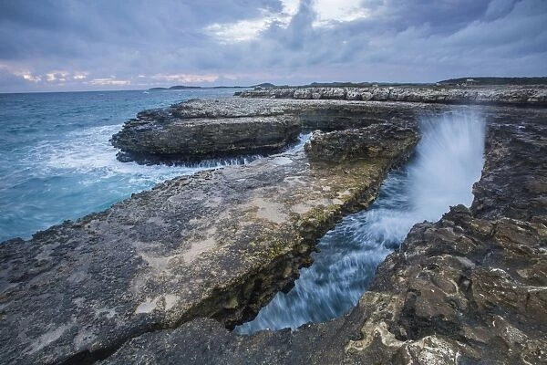 Geological Devils Bridge, a natural arch carved by the sea from soft and hard limestone