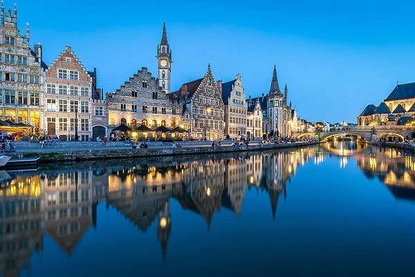 Graslei Quay in the historic city center of Ghent, mirrored in the River Lys during
