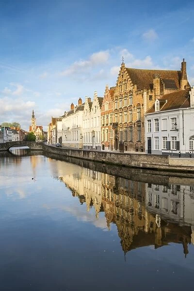 Houses reflected in the Langerei canal, Bruges, West Flanders province, Flemish region