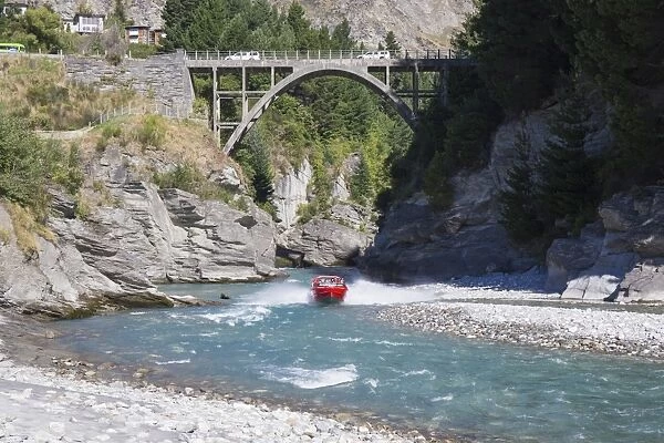 Jet boat on the Shotover River below the Edith Cavell Bridge, Queenstown, Queenstown-Lakes district
