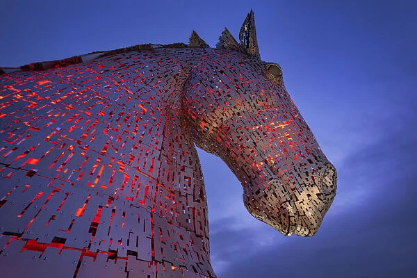 One of the two Kelpies sculptures at night, near Falkirk, Stirlingshire, Scotland, United Kingdom, Europe