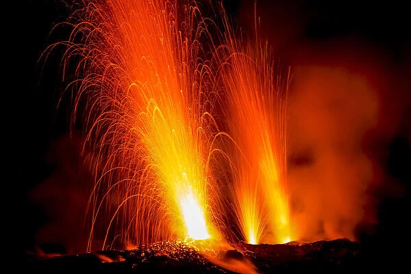 Lava bombs erupt from multiple vents on volcano, active for at least 2000 years, Stromboli, Aeolian Islands, UNESCO World Heritage Site, Sicily, Italy, Mediterranean, Europe