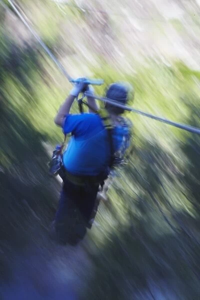 Man sliding down a zip-line, Storms River, Eastern Cape, South Africa, Africa