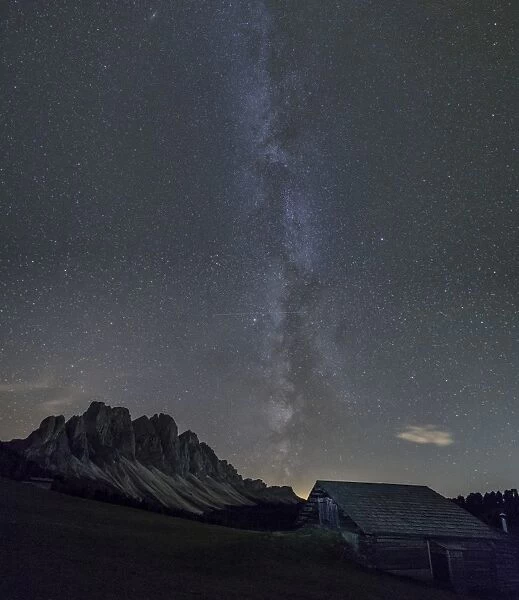 The Milky Way in the starry sky above the Odle, Funes Valley, South Tyrol, Dolomites