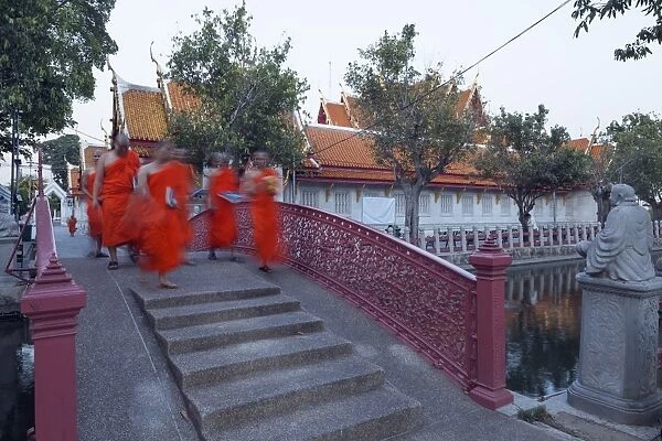 Monks in saffron robes, Wat Benchamabophit (The Marble Temple), Bangkok, Thailand