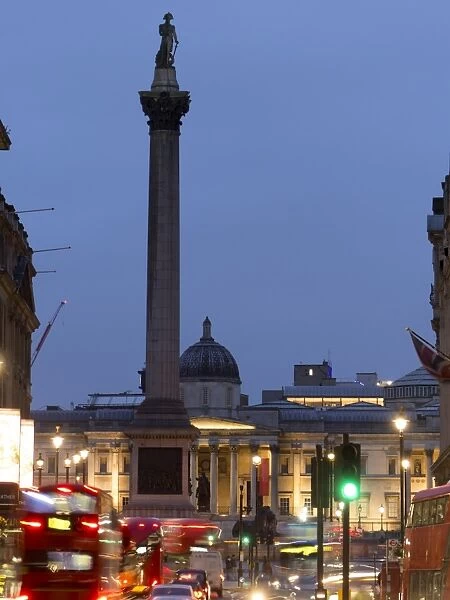 Nelsons Column and National Gallery at dusk, Trafalgar Square, London, England United Kingdom