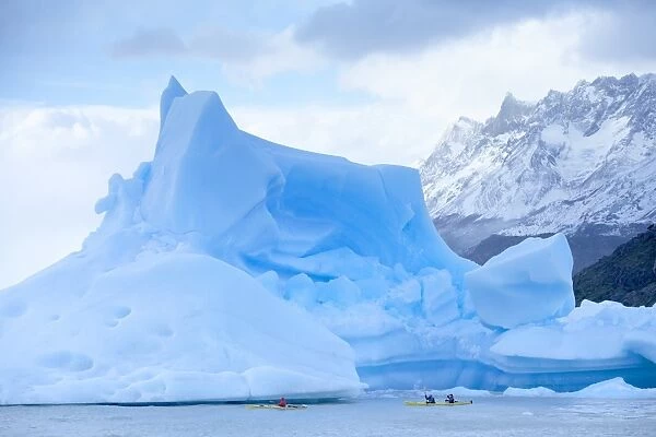 People kayaking near floating icebergs, Lago Gray (Lake Gray), Torres del Paine National Park