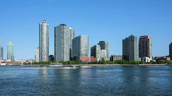 The Pepsi-Cola sign, built in 1940, a neon sign at Gantry Plaza State Park in the Long Island City neighborhood of Queens, visible fromManhattan the East East River, New York City, United States of America, North America