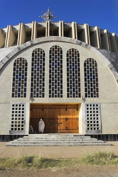 Pilgrim at doors of St. Mary of Zion new church, built by Haile Selassie in the 1960s