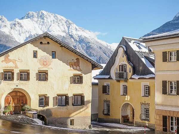 A plaza in the Alpine village of Sent in winter, Graubunden, Switzerland, Europe