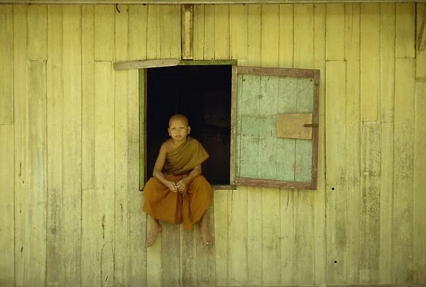 Portrait of a young monk at Wat Phawtpo in Chiang Mai