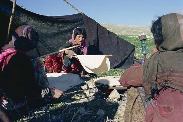 Qashqai women making bread in camp