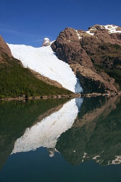 Reflections of a glacier in Chilean Fjordland, Magallanes, Chile, South America