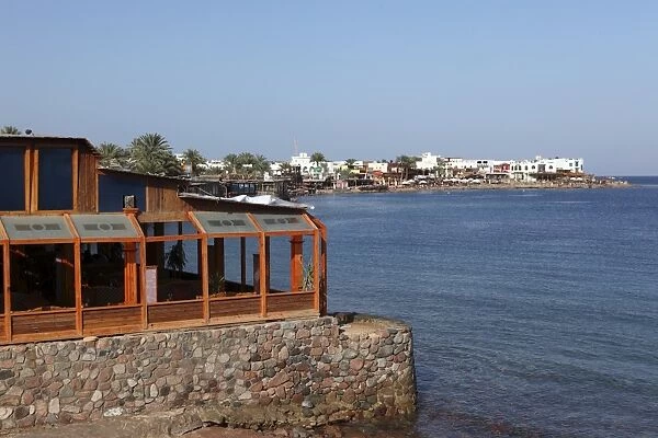 A restaurant overlooks the harbour of the Red Sea resort town of Dahab in Egypt