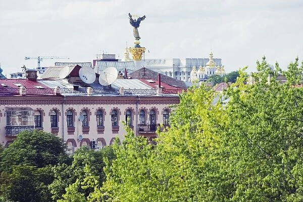 Rooftops and symbol of Kiev statue, Kiev, Ukraine, Europe
