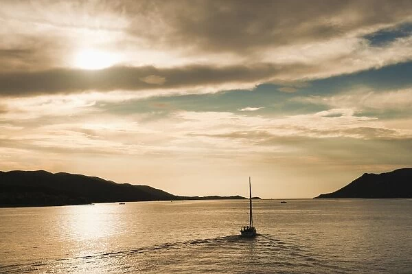 Sailing boat at sunset on the Dalmatian Coast, Adriatic, Croatia, Europe