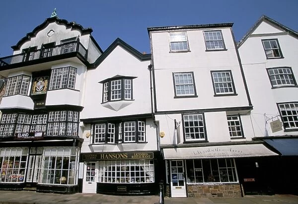 Shops in Tudor buildings, Cathedral Green, Exeter, Devon, England, United Kingdom, Europe