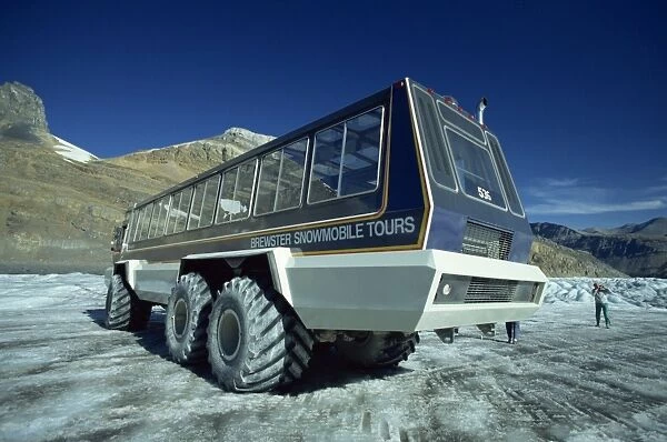 Snowmobile that takes tourists onto the Athabasca Glacier in Jasper National Park in the Rocky Mountains in British Columbia, Canada