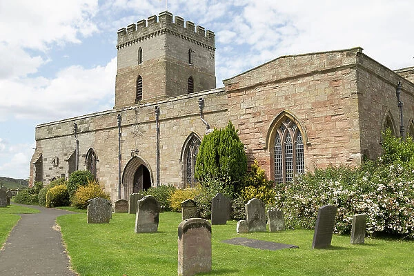 St. Aidan's Church, a 12th century place of worship, a key location in spreading Christianity during the Anglo-Saxon era, and its churchyard, Bamburgh, Northumberland, England, United Kingdom, Europe