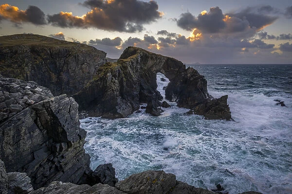 Stac a Phris Natural Sea Arch at sunset, near Shawbost, Isle of Lewis, Outer Hebrides