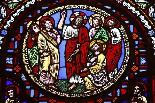 Stained glass in Ainay Basilica depicting Jesus giving keys to St