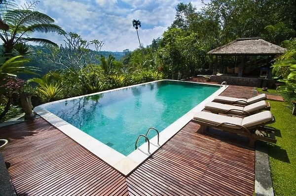 Swimming pool area at luxury accommodation near Ubud, Bali, Indonesia, Southeast Asia, Asia