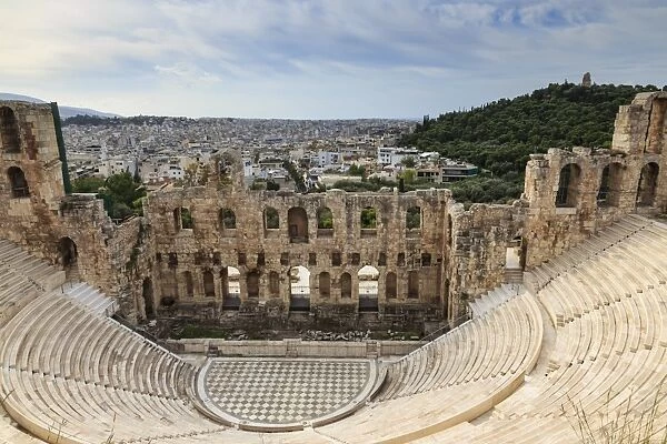 Theatre of Herod Atticus below the Acropolis with the Hill of Philippapos and city view