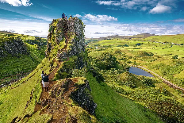 Tourists explore Fairy Glenn, Isle of Skye, Inner Hebrides, Scotland, United Kingdom, Europe