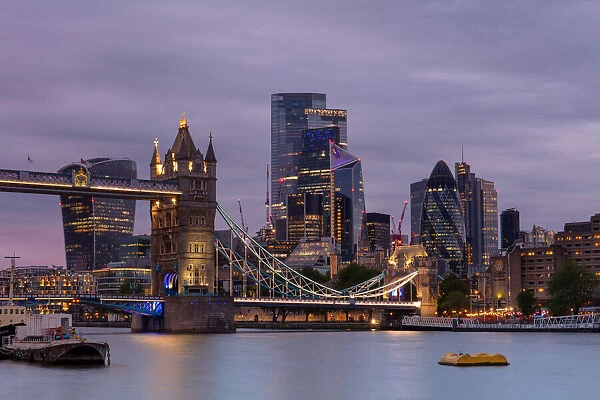 Tower Bridge and The City of London at sunset, London, England, United Kingdom, Europe