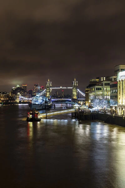 Tower Bridge and HMS Belfast on River Thames at night, London, England, United Kingdom, Europe