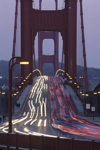 Traffic on the Golden Gate bridge at dusk