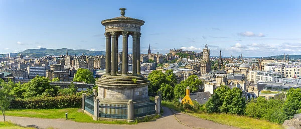 View of city centre skyline and Dugald Stewart Monument, Edinburgh, Scotland