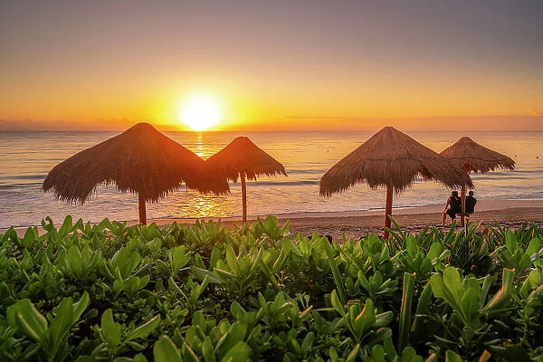 View of couple at sunrise and beach near Puerto Morelos, Caribbean Coast, Yucatan Peninsula, Mexico, North America