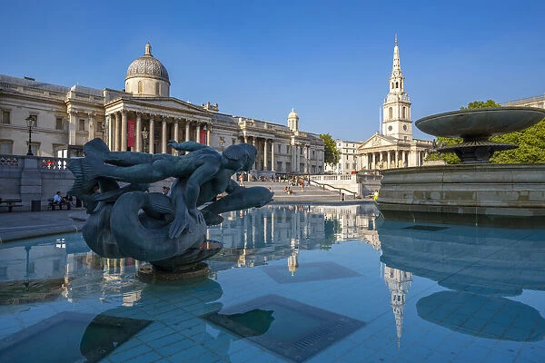 View of The National Gallery and fountains in Trafalgar Square, Westminster, London