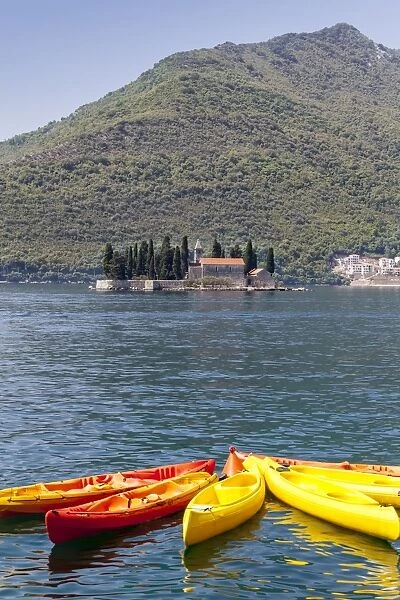 View of St. George Island with kayaks in the foreground, Perast, Bay of Kotor, UNESCO World Heritage Site, Montenegro, Europe