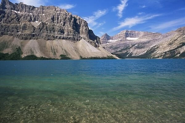 View across turquoise waters of Bow Lake in summer, Banff National Park