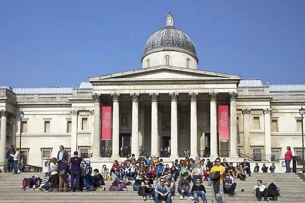 Visitors and tourists outside the National Gallery, Trafalgar Square, London, England, United Kingdom, Europe