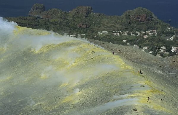 Volcanic steam issuing from sulphurous fumaroles at the rim of the Gran Cratere