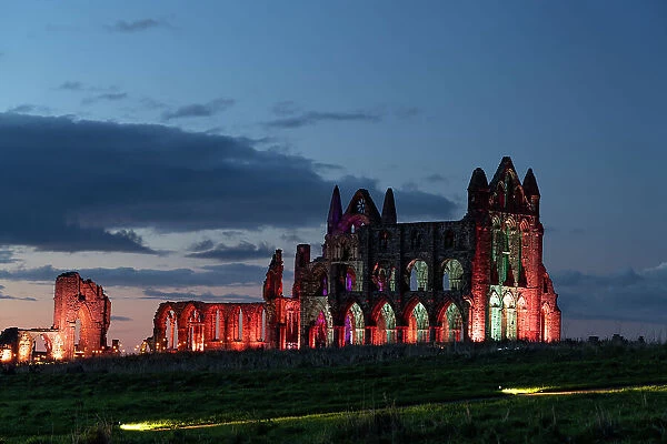 Whitby Abbey illuminated in October 2023, The Yorkshire coast, Whitby, Yorkshire, England, United Kingdom, Europe